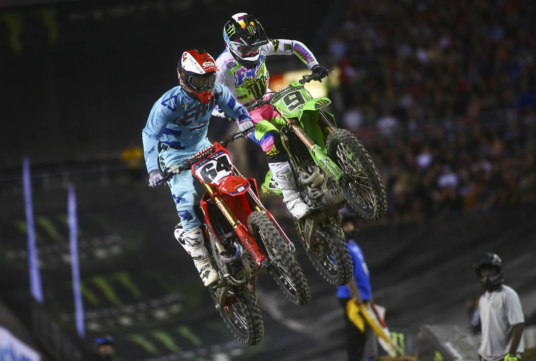 Vince Friese (64) and Adam Cianciarulo (9) compete during the second round of the Monster Energ ...
