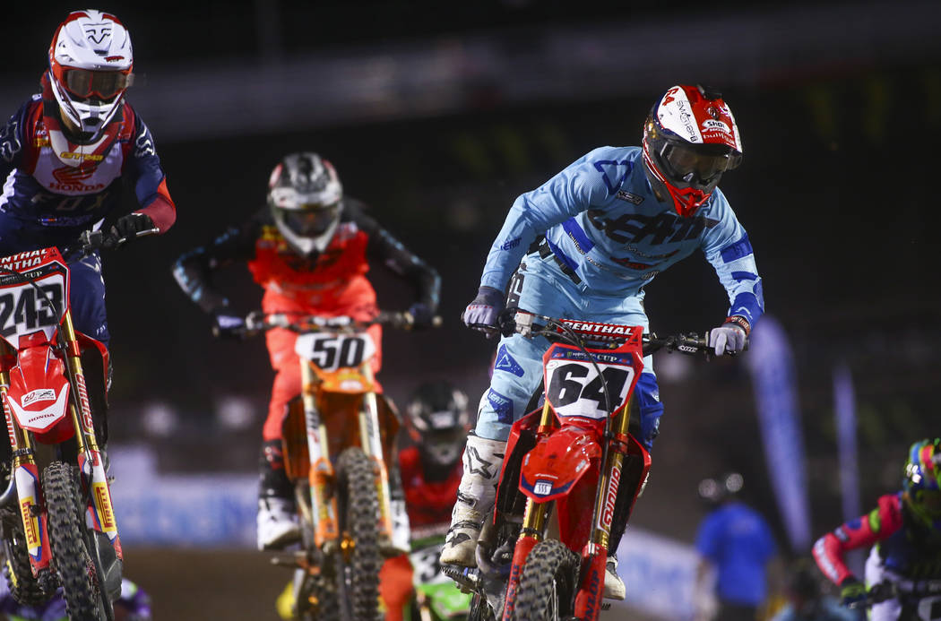 Tim Gajser (243), Benny Bloss (50) and Vince Friese (64) compete during the second round of the ...