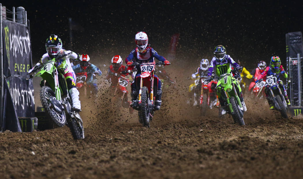 Adam Cianciarulo (9), Tim Gajser (243), and Eli Tomac (1) lead the pack during the third main e ...