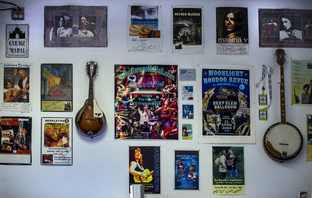Posters and memorabilia hang in the Garage Mahal during the 2nd Annual Fall into the Blues Fest ...