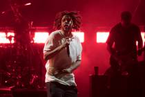 J. Cole performs during a campaign rally for Democratic presidential candidate Hillary Clinton ...