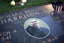 The grave of Richard "Old Man" Harrison sits at Palm Northwest Cemetery on Monday, Oct. 21, 201 ...