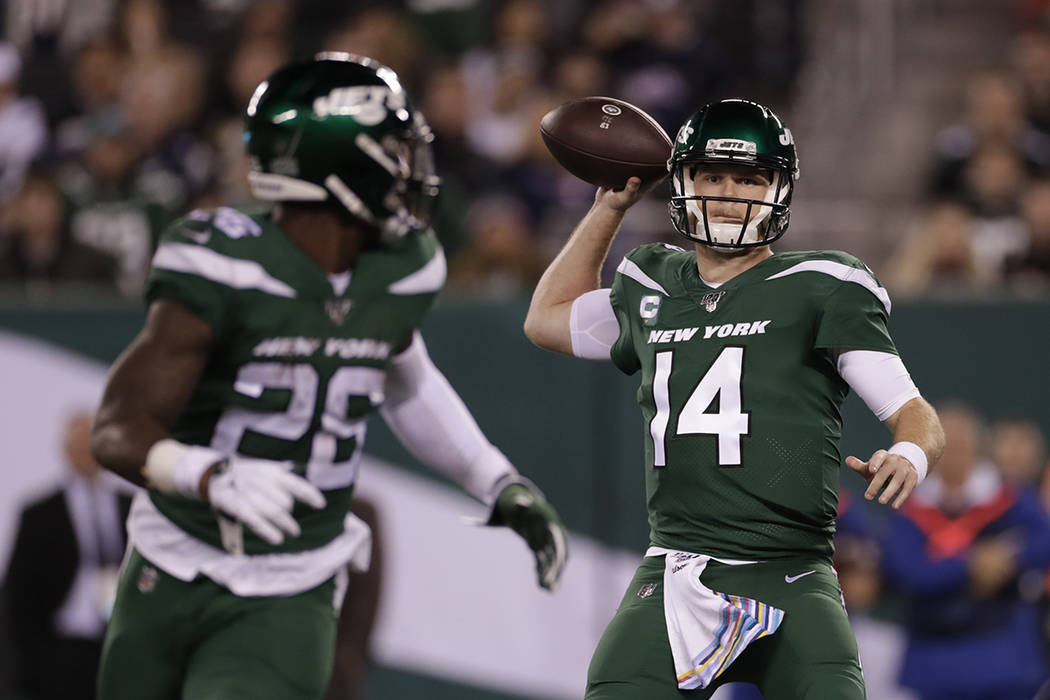 New York Jets quarterback Sam Darnold (14) throws a pass during the second half of an NFL footb ...