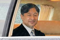 Japan's Emperor Naruhito depart for the Imperial Palace in Tokyo, Tuesday, Oct. 22, 2019. Empe ...