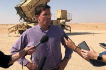Defense Secretary Mark Esper talks to reporters at Prince Sultan Air Base in Saudi Arabia, Tues ...