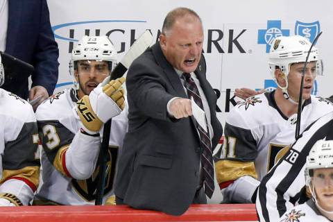 Vegas Golden Knights' Gerard Gallant, center, yells towards an official during the third period ...