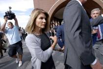 In this Aug. 27, 2019 file photo, actress Lori Loughlin departs federal court in Boston after a ...
