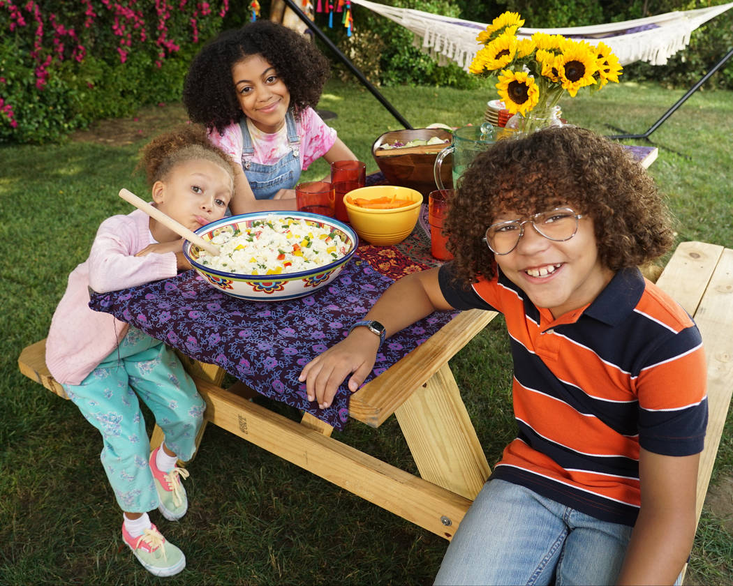 Ethan William Childress, right, with Mykal-Michelle Harris and Arica Himmel, stars as in "Mixed ...