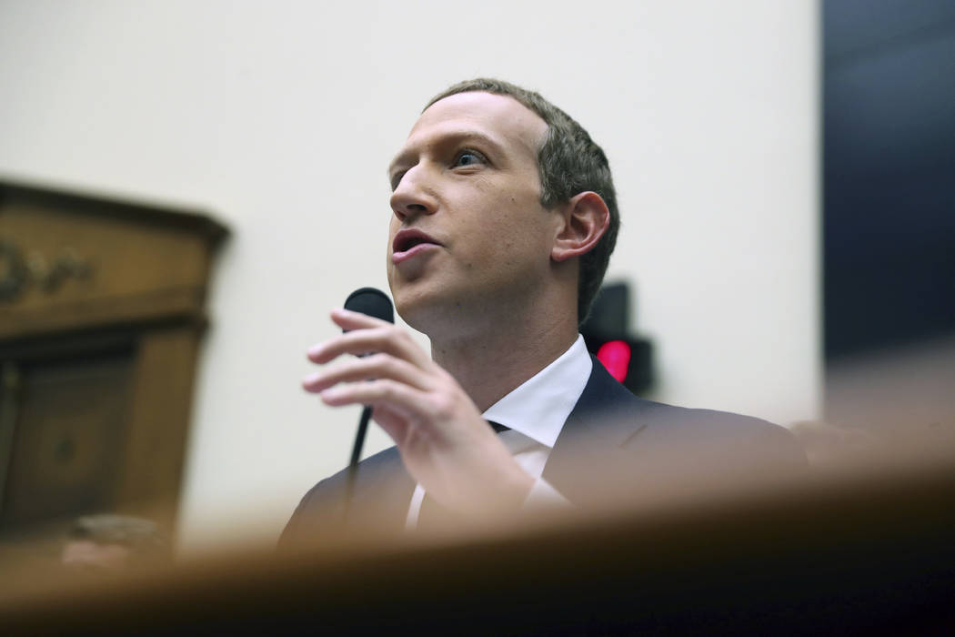 Facebook CEO Mark Zuckerberg testifies before a House Financial Services Committee hearing on C ...