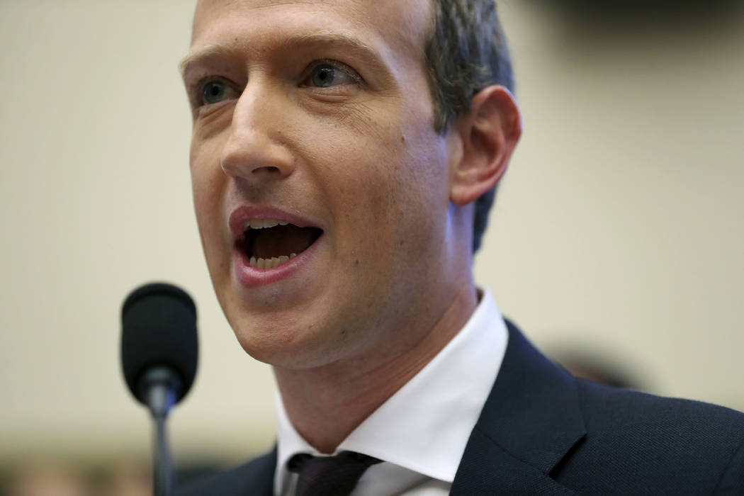 Facebook CEO Mark Zuckerberg testifies before a House Financial Services Committee hearing on C ...