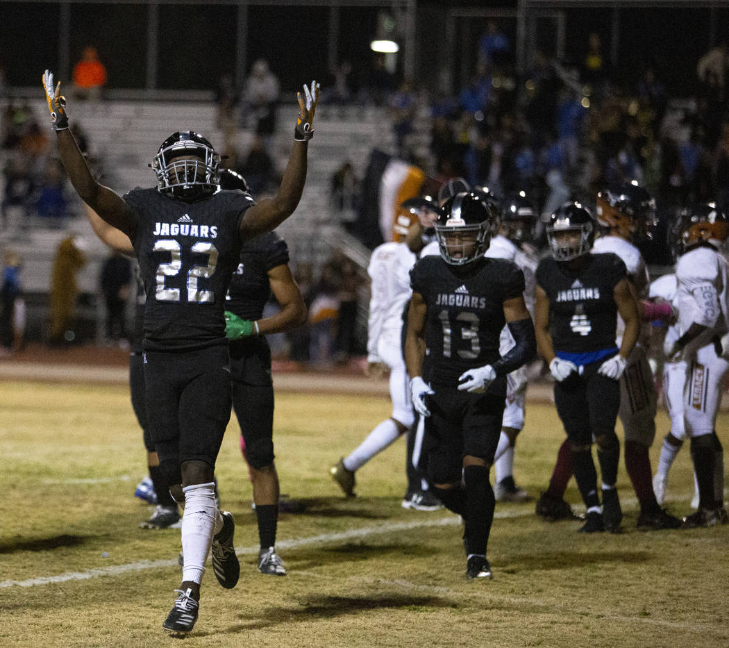 Desert Pines running back Javontae Barnes celebrates the first touchdown of the night against L ...