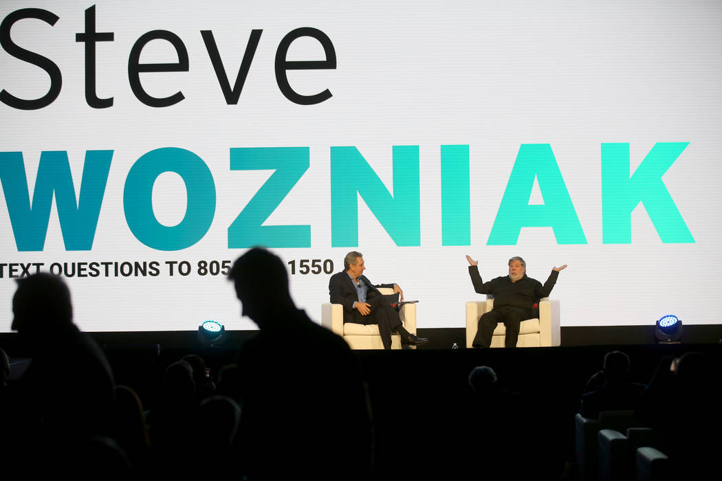 Steve Wozniak, right, is interviewed by J.D. Power President and CEO Dave Habiger during the 20 ...