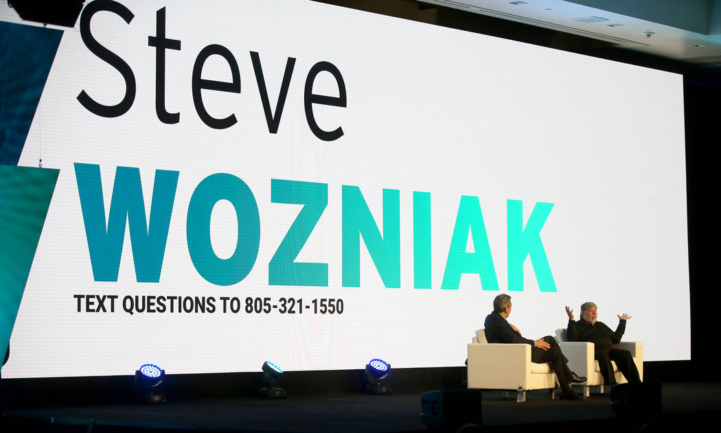 Steve Wozniak, right, is interviewed by J.D. Power President and CEO Dave Habiger during the 20 ...