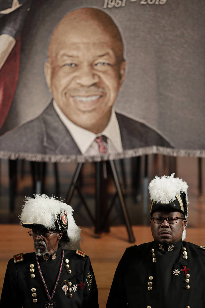 Masonic guards stand in front of an image of the late U.S. Rep. Elijah Cummings during a viewin ...