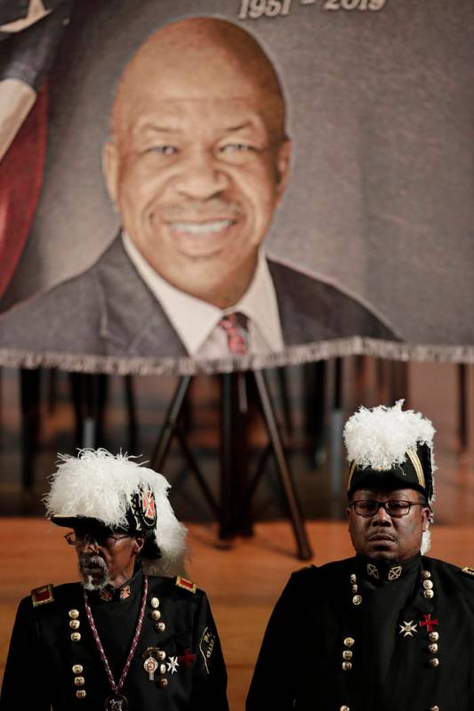 Masonic guards stand in front of an image of the late U.S. Rep. Elijah Cummings during a viewin ...