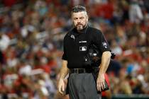 FILE--Umpire Rob Drake stands on the field during a baseball game between the Atlanta Braves an ...