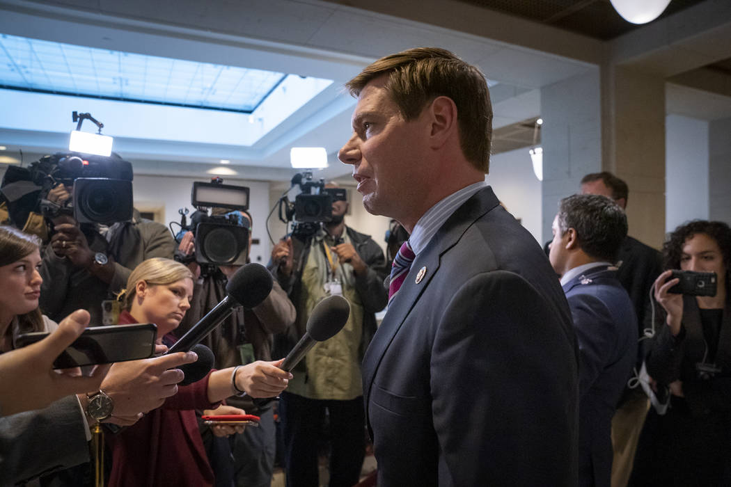 Rep. Eric Swalwell, D-Calif., a member of the House Intelligence Committee, answers questions f ...