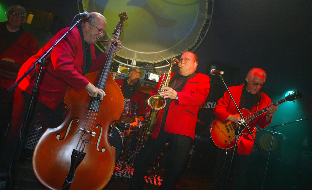 The five surviving members of the rock 'n' roll band Bill Haley & The Comets perform after ...