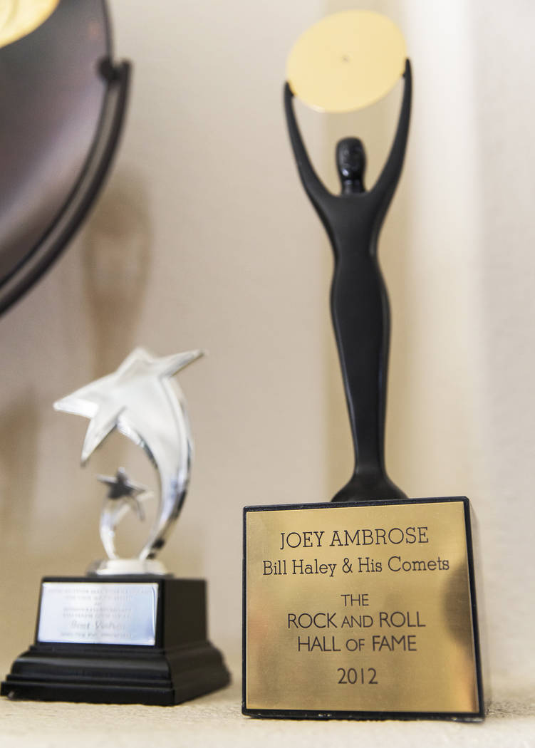 Joe D'Ambrosio's Rock & Roll Hall of Fame statue, right, at his home in Henderson on Friday ...