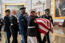 The late Maryland Rep. Elijah Cummings is carried through the Rotunda of the Capitol to lie in ...