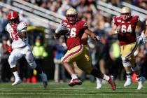 Boston College running back David Bailey (26) carries the ball against North Carolina State dur ...