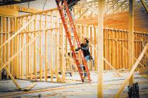 Tonya Harvey RJRealEstate.Vegas This file photo shows a worker at a new-home construction site. ...