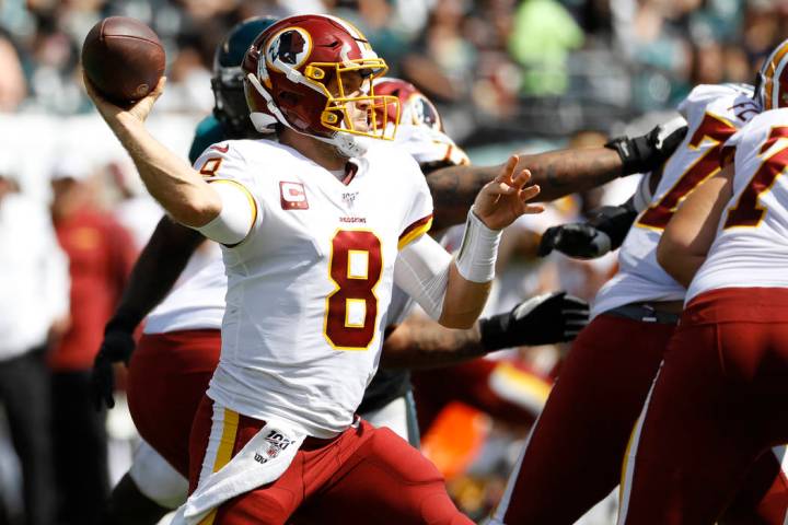 Washington Redskins' Case Keenum in action during the first half of an NFL football game agains ...