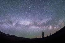 The Milky Way is seen at the foot of the Boulder Mountains in the Sawtooth National Recreation ...