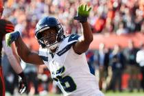 Seattle Seahawks wide receiver Tyler Lockett (16) reacts against the Cleveland Browns during an ...