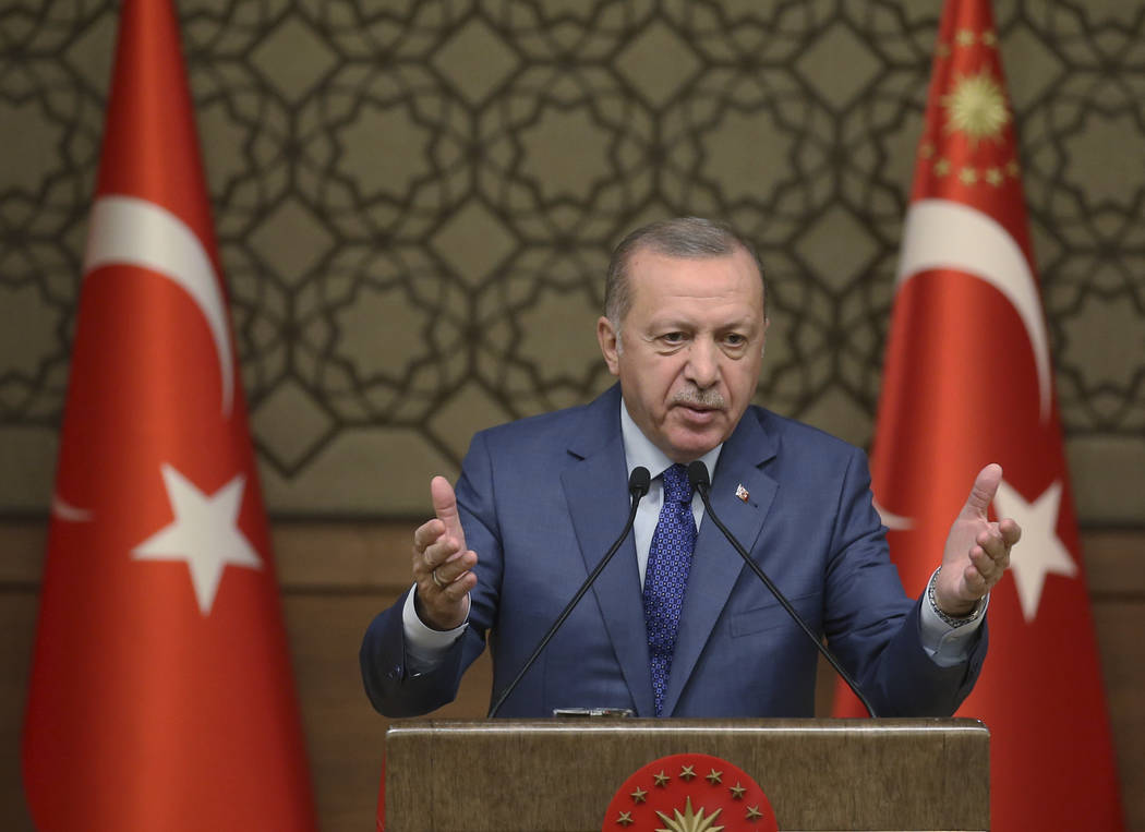Turkish President Recep Tayyip Erdogan speaks during a meeting at his presidential palace, in A ...
