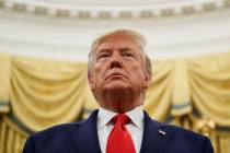 President Donald Trump stands during a Presidential Medal of Freedom ceremony for auto racing g ...