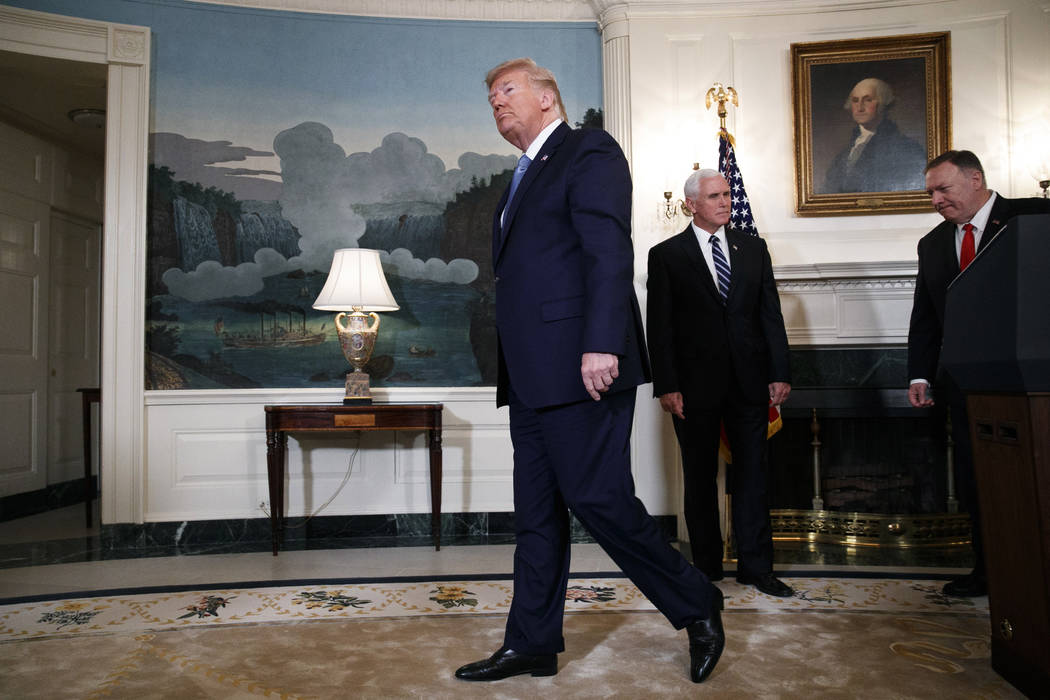 President Donald Trump, left, followed by Vice President Mike Pence and Secretary of State Mike ...