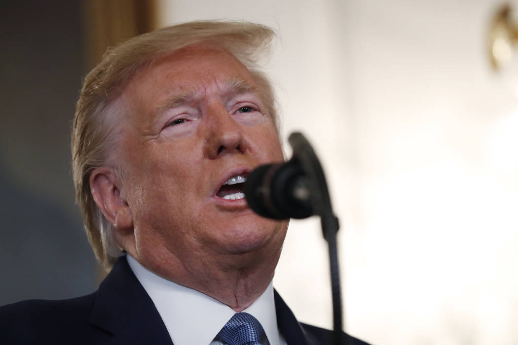 President Donald Trump speaks Wednesday, Oct. 23, 2019, in the Diplomatic Room of the White Hou ...