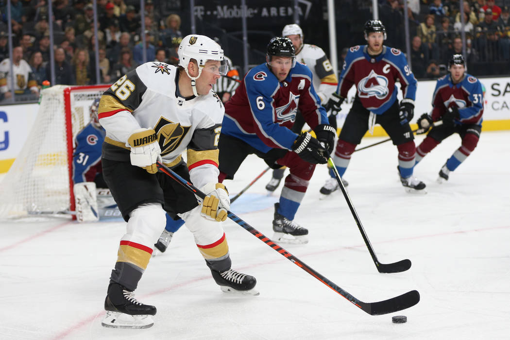 Vegas Golden Knights center Paul Stastny (26) looks for an open pas against Colorado Avalanche ...