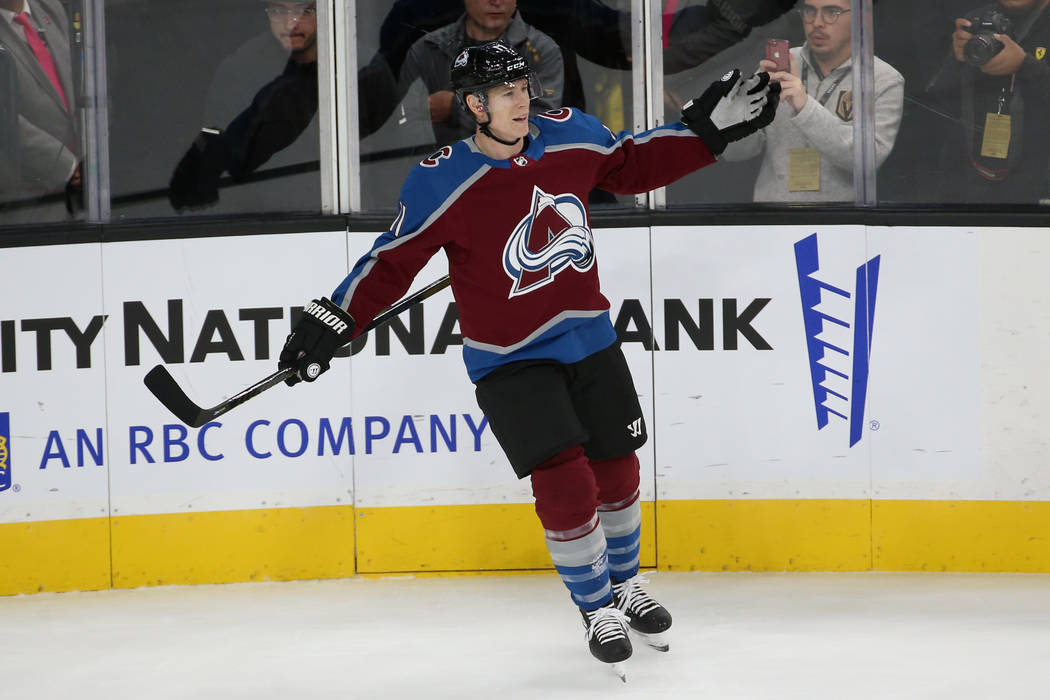 Colorado Avalanche left wing Matt Calvert (11) celebrates a score against the Vegas Golden Knig ...