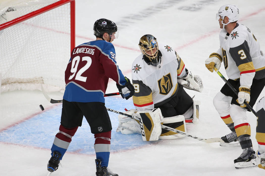 Vegas Golden Knights goaltender Marc-Andre Fleury (29) and defenseman Brayden McNabb (3) with C ...