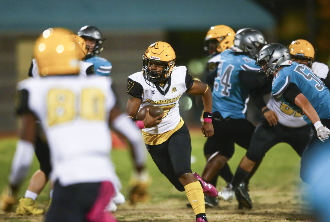 Clark quarterback My'quel Johnson (7) runs the ball during the first half of a football game at ...