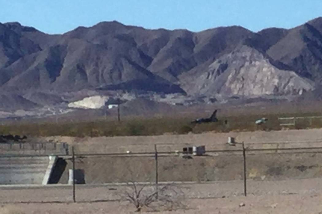 An airplane that ran off the runway at Boulder City Municipal Airport is visible from a distanc ...