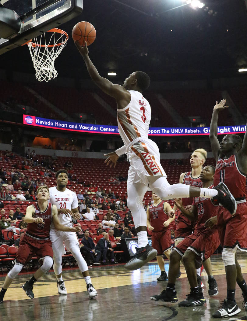 UNLV's guard Amauri Hardy (3) goes for the basket during the first half of their game against W ...
