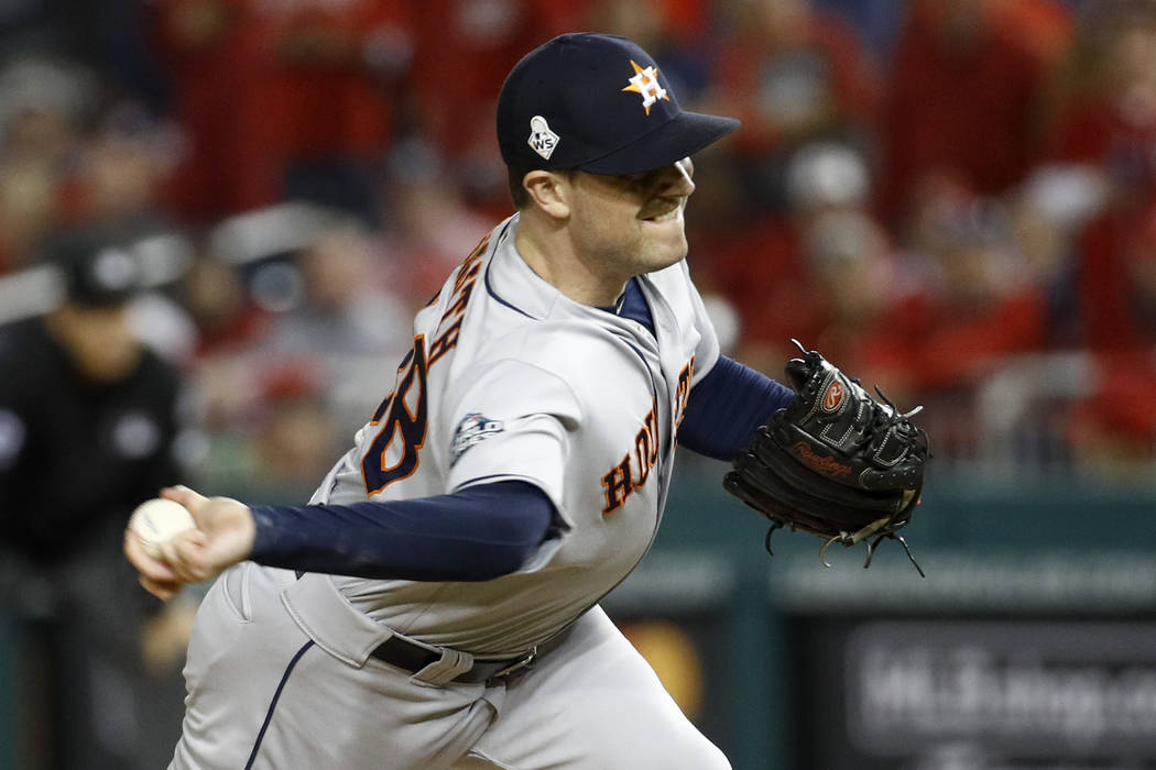 Houston Astros relief pitcher Joe Smith throws against the Washington Nationals during the eigh ...