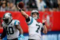 Carolina Panthers quarterback Kyle Allen (7) warms up before an NFL football game against the T ...