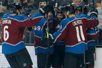 Colorado Avalanche players celebrate after Colorado Avalanche left wing Pierre-Edouard Bellemar ...