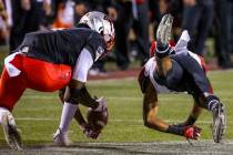 UNLV Rebels wide receiver Randal Grimes (4) makes a difficult catch as San Diego State Aztecs c ...