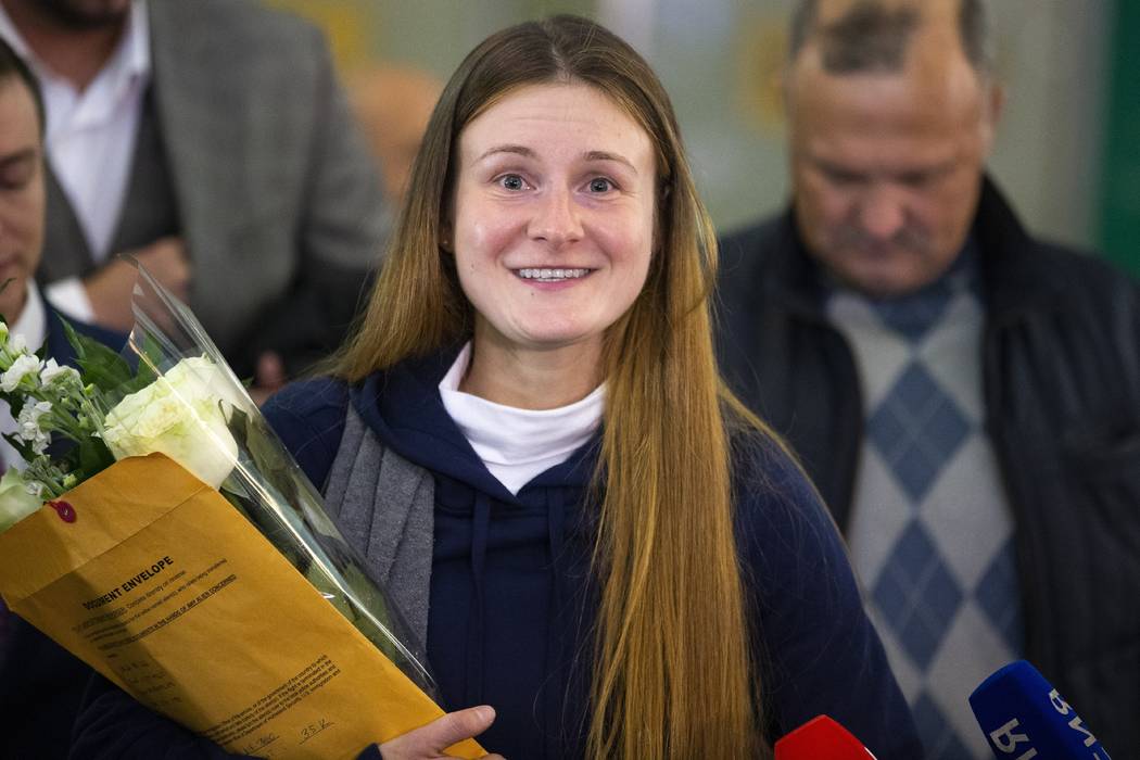 Russian agent Maria Butina smiles as she speaks to journalists upon her arrival from the United ...