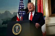 President Donald Trump speaks in the Diplomatic Room of the White House in Washington, Sunday, ...