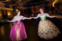 Abby Cox, of Reno, left, and Christina DeAngelo, of Sparks, both wearing custom period ballgown ...