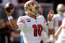 San Francisco 49ers quarterback Jimmy Garoppolo throws the ball during the first half of an NFL ...