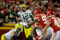 Green Bay Packers quarterback Aaron Rodgers (12) throws a pass against Kansas City Chiefs defen ...