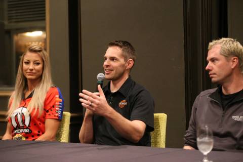 Drivers Andrew Hines, center, with Leah Pritchett, left, and Matt Hartford, speaks during a pre ...