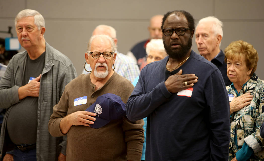 Former Nevada Test Site workers, from left, Robert McClone, 85, John Haslam, 77 and Cle Threats ...